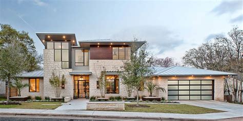 The use of clean lines inside and out, without any superfluous decoration, gives each of our modern homes an uncluttered frontage and utterly roomy, informal living spaces. Elegant Suburban House With Exposed Interior Wood Beams