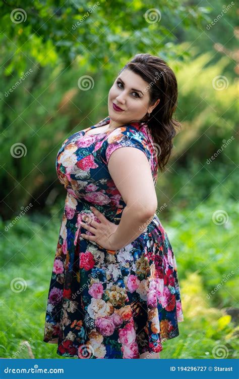 Happy Plus Size Fashion Model In Floral Dress Outdoors Beautiful Fat