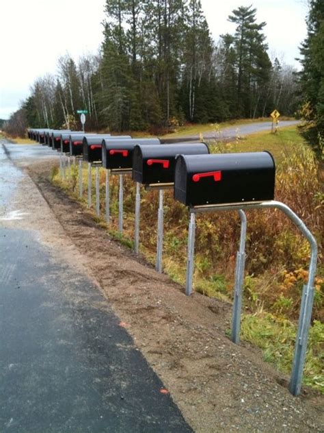 Harsh winter weather is no match for the durable design of the postal wedge. SwingSAFE - Swinging mailbox | Modern mailbox post, Modern ...