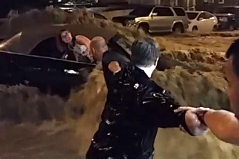 Maryland Floods Passers By Form Human Chain To Rescue Trapped Driver