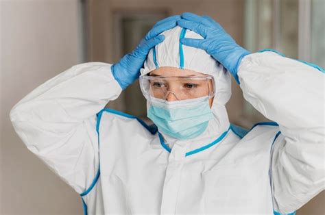 Premium Photo Female Doctor Wearing Protective Equipment