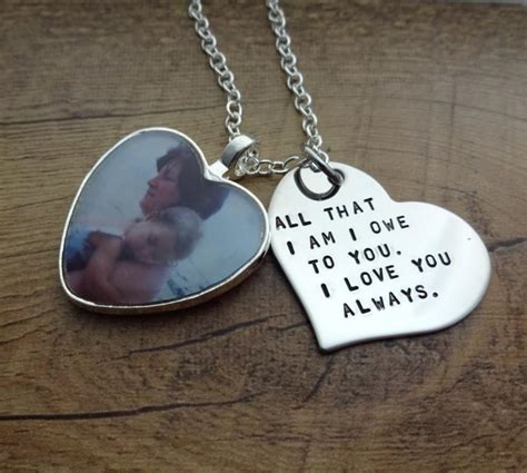 A simple yet useful gift for the mother of the bride, she'll forever remember the special day of your wedding and although tears may start falling, we're sure that those. Personalized Hand Stamped Heart Photo Charm Necklace ...