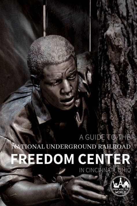 A Man Leaning Against A Tree With The Words National Underground