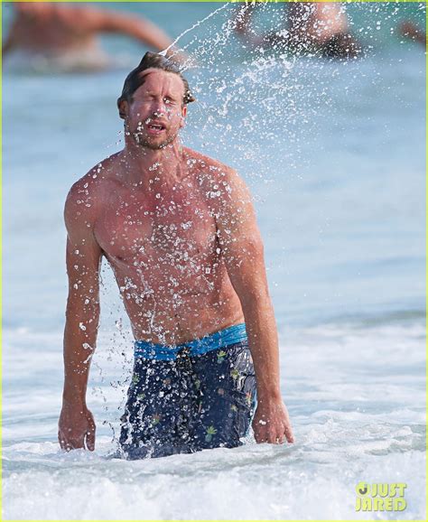Full Sized Photo Of Simon Baker Shirtless Surfing Mentalist Series
