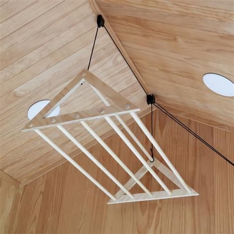 Pulley ceiling or roof cloth dryer with advanced features offering convenience and hygiene. Ceiling Laundry Rack, Clothes Drying Rack, Wooden Drying ...