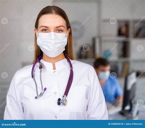 Female Doctor In Surgical Mask In Medical Office Stock Photo Image Of