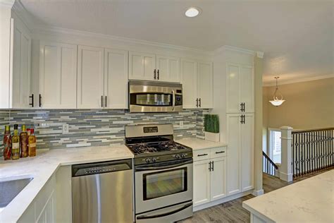 Kitchen cabinets with black appliances. The Best Appliance Finish for Your Kitchen Design | First ...