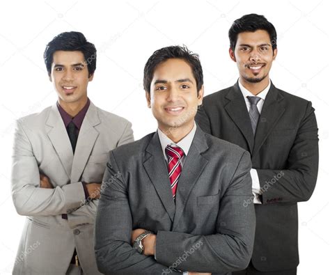 Portrait Of Three Businessmen Standing With Their Arms Crossed A Stock