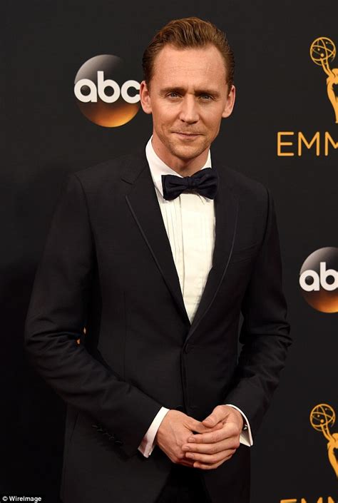 Tom Hiddleston Walks Emmys Red Carpet Without Taylor Swift