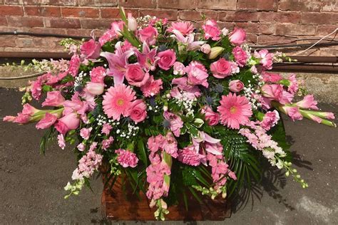 Assorted Pink Flower Casket Spray Anamosa Floral Inc