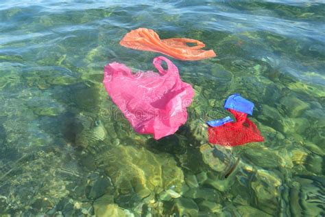 Colorful Plastic Bags Floating In The Ocean Stock Image Image Of