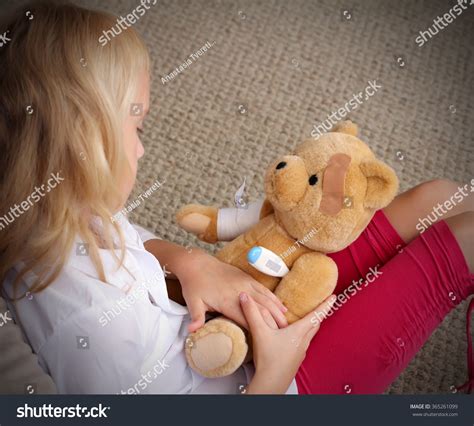 Adorable Little Girl Playing Doctor Her Stock Photo 365261099