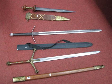 A Reproduction Roman Officers Sword A Reproduction Claymore And