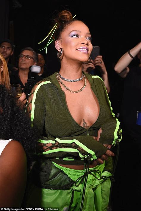 Rihanna Gives A Flash Of Cleavage At Nyfw Show Daily Mail Online