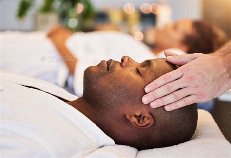 Black Man Relax And Head Massage With Therapist Hands In A Luxury Spa Wellness And Skincare On