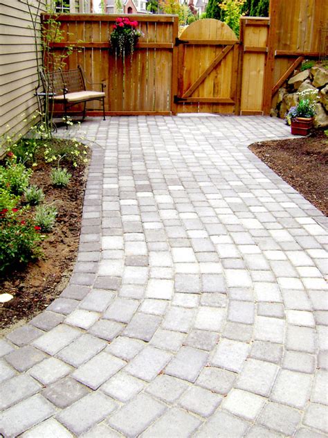 Irregular bluestone paving and masonry seatwalls make this space distinctive from the main gathering area. Gorgeous Stone Walkways To Add Your Home