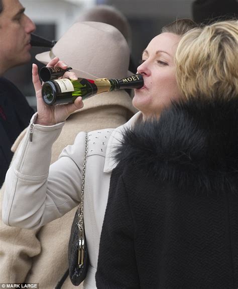 Cheltenham Festival Girls Guzzle Champagne With A Moet Funnel Daily