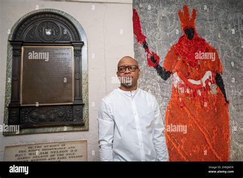 Artist Victor Ehikhamenor With His Artwork Still Standing After Its