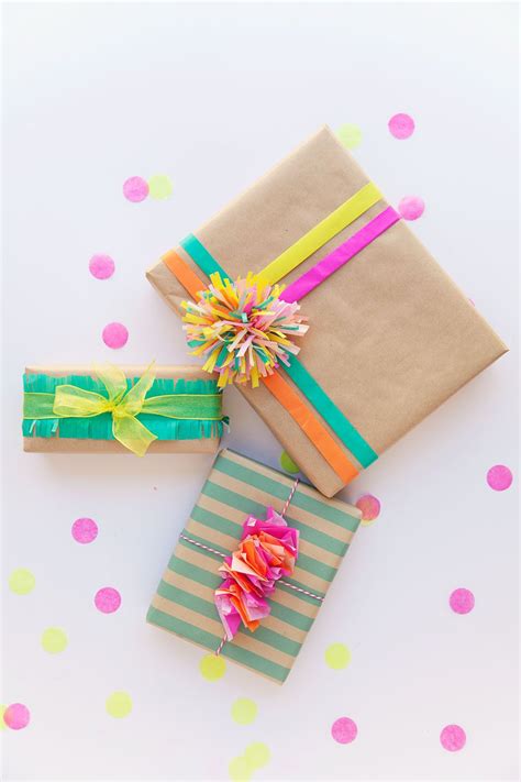 Three Wrapped Presents With Colorful Ribbons And Bows