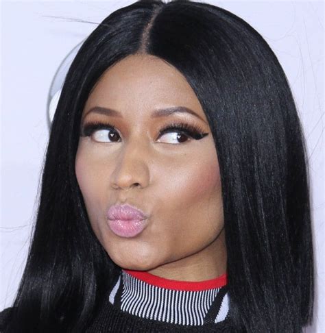 Nicki Minaj Rocks High Neck Mini Dress With Side Cutouts