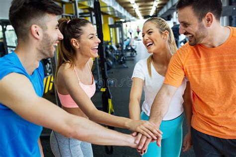 Happy Fit Friends Having A Sports Greeting Afther Workout At The Gym
