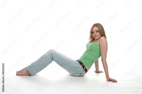 Woman Sitting And Leaning Back On Her Arms Stock Photo Adobe Stock