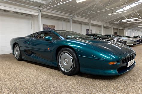 The jaguar xj220, launched in production form in 1992, cost a staggering £450,000, but had a top speed of 217mph (without. Silverstone Green Jaguar XJ220 is for Sale at McGurk ...