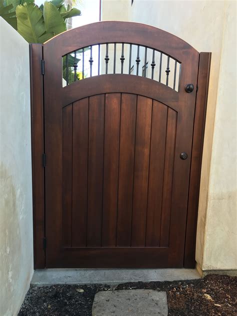 Custom Wood Gate With Decorative Metal Pickets By Garden Passages