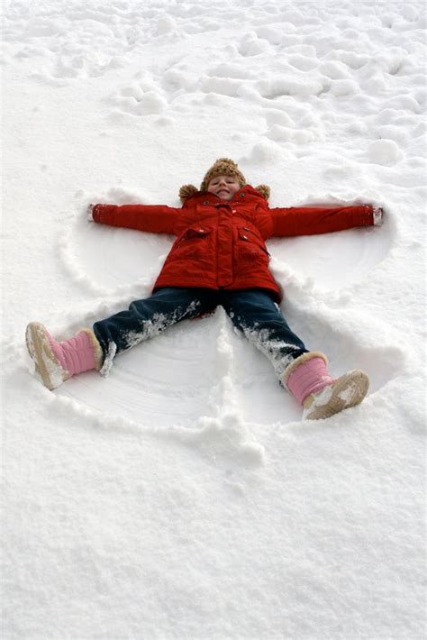 Salt And Pepper Snow Angel With A Wobbly Tooth