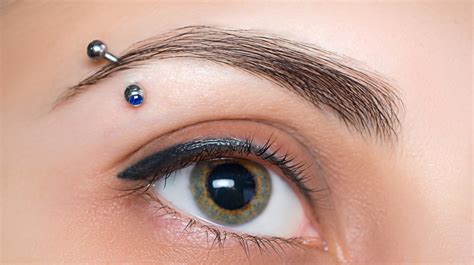 The Definitive Guide To All The Types Of Eyebrow Piercings