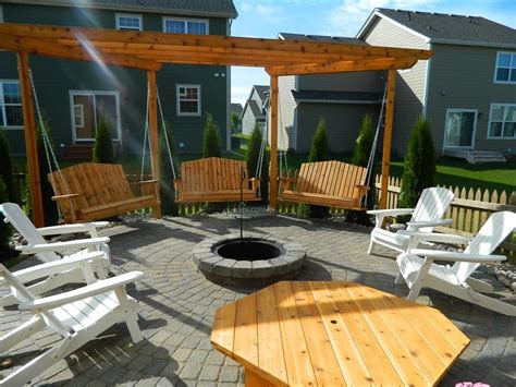 Fire Pit And Swings On Paver Patio Backyard Fire Outdoor Fire Pit