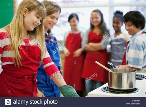Middle School Students In Home Economics Class Stock Photo Alamy