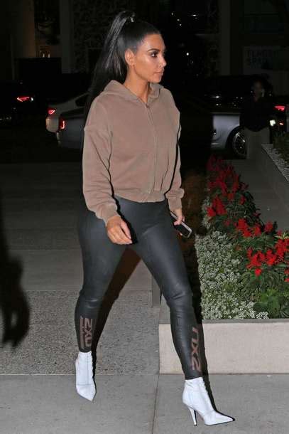 sweater kim kardashian kardashians fall outfits hoodie boots leggings wheretoget