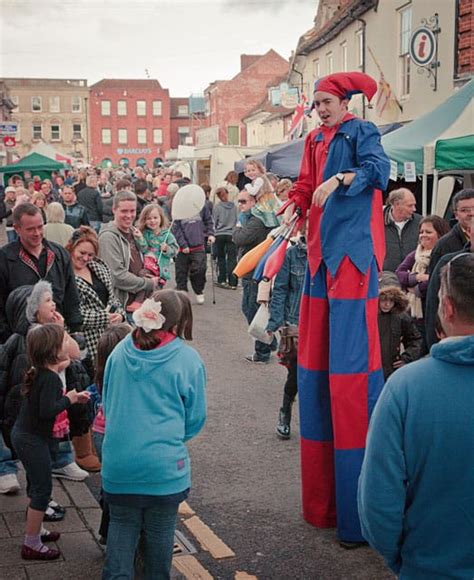 Stilt Walking Jester At Festival Web Copy Dorset Childrens Party