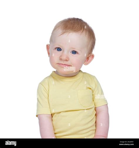Curious Kid Studio Shot Of A Cute Baby Boy In A Yellow Shirt Stock