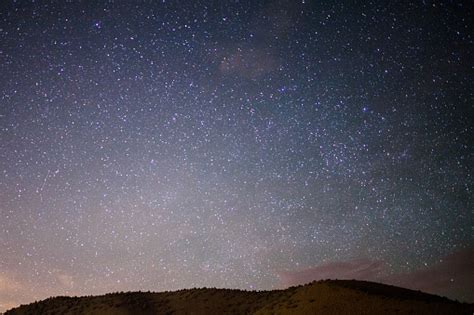 Starry Night And Hill Stock Photo And More Pictures Of Astronomy Istock