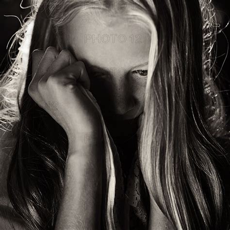 Caucasian Girl Covering Her Face Photo12 Tetra Images Vladimir Serov