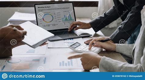 business people are meeting for analysis data figures to plan business strategies business
