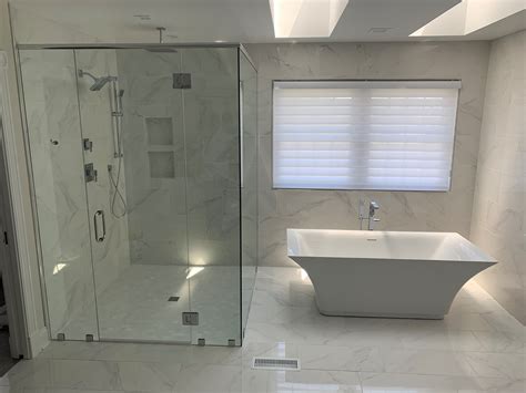 Full View Of Master Bath Of Bath Tub And Luxurious Glass