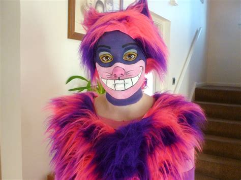 My daughter wanted a cheshire cat costume from the disney cartoon version of alice in wonderland. Pin by Katharyn Stefanovski on Halloween | Alice in wonderland makeup, Cheshire cat face paint ...
