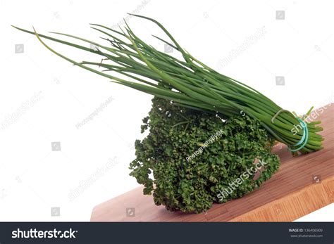 Chives And Parsley On Wooden Board Spices And Ingredients Stock Photo