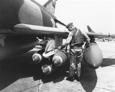 Fcba Colonel Robin Olds Checks The Ordnance On His F 4 Phantom Ii