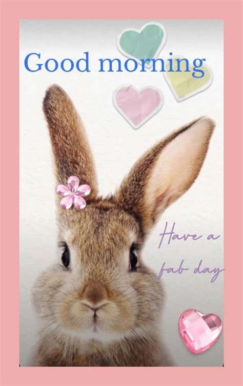 A Rabbit With Pink Flowers On Its Head And Hearts Around It S Ears In