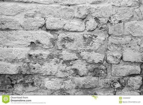 The industrial appeal of brick is softened with age in this wallpaper. Aged Cracked White Brick Wall Background Stock Image ...