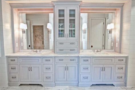 The tower doesn't only work as an extra storage space, but also a divider between the sink and toilet area. Bathroom Tower Cabinet Gorgeous Double Vanity With Center ...
