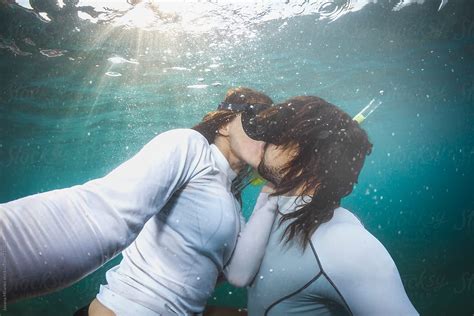 Couple Kissing Underwater Stocksy United