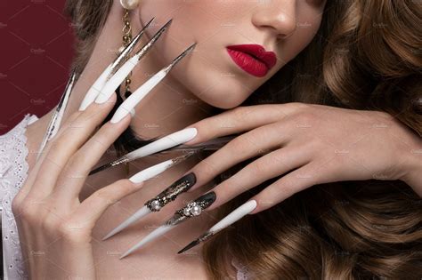 Beautiful Redhair Model Curls Bright Gold Makeup Long Nails And Red