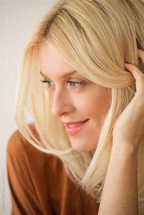 Indoor Portrait Of A Beautiful Blonde Caucasian Woman