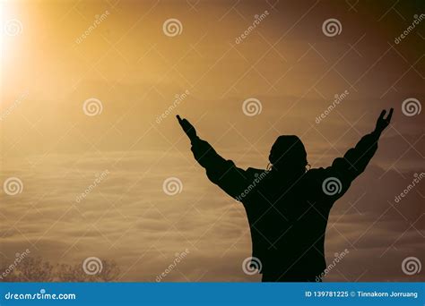 Man Praying At Sunset Mountains Raised Hands Travel Lifestyle Spiritual