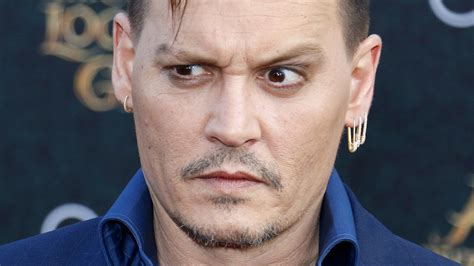 Johnny Depp Lets His Feelings About Amber Heard Out With A Subtle Accessory Trendradars Latest